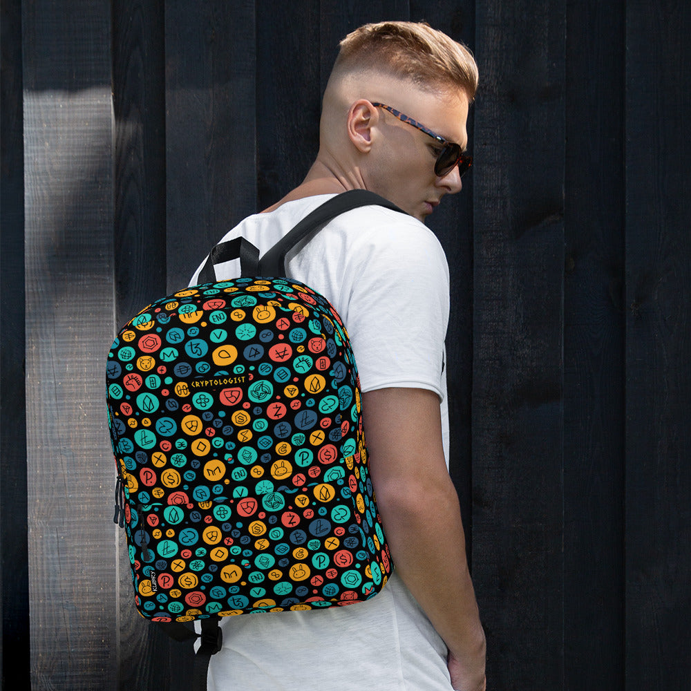 Young man with Personalised Cryptocurrency Backpack, designer print with Bitcoin and Altcoins.