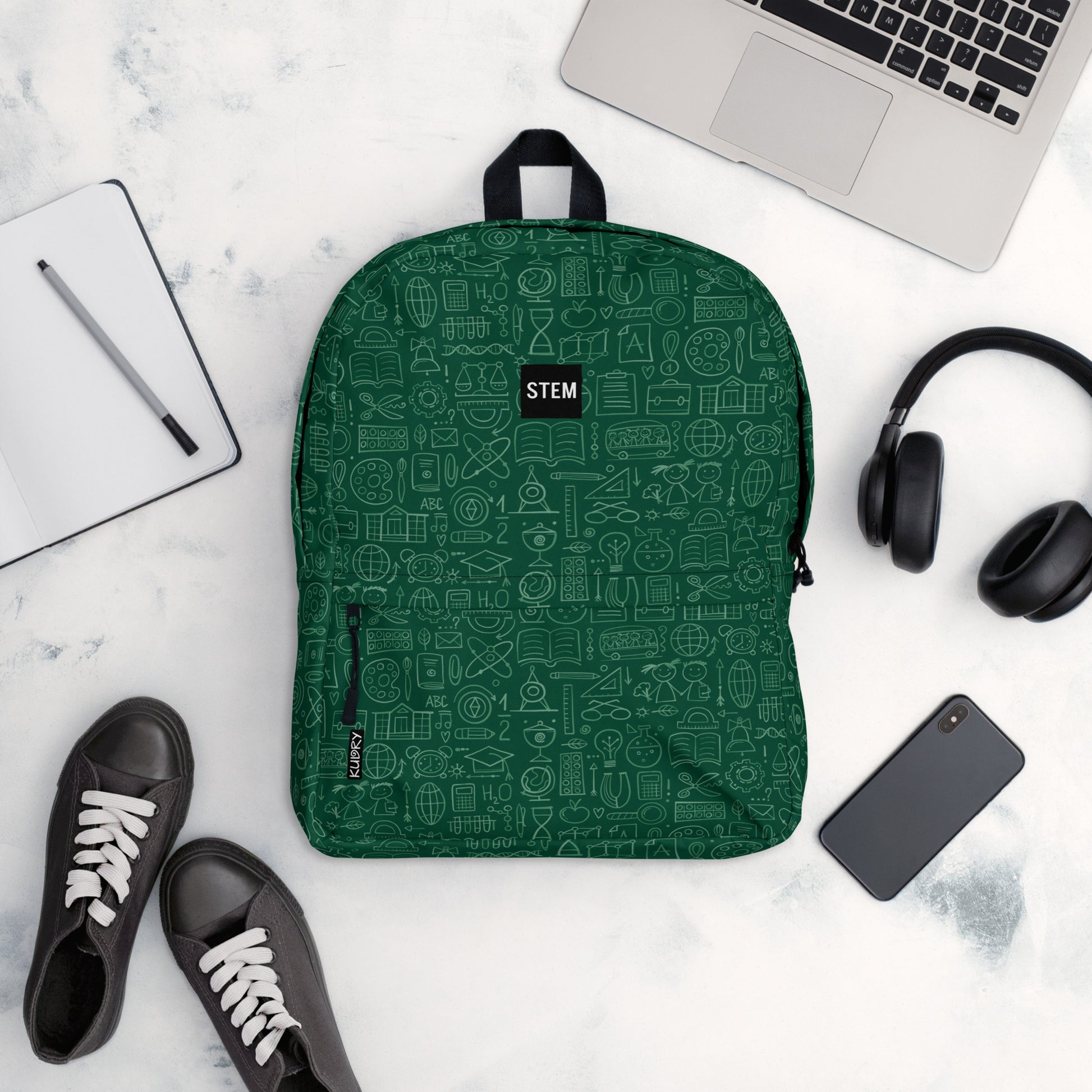 Personalised School Backpack , dark green color,and accessories on table, STEM-themed, stylish designer print