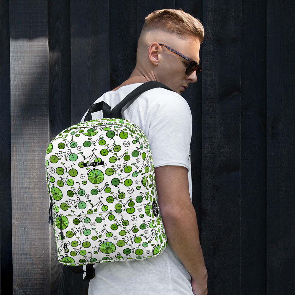 Man with personalised Backpack with green bicycles collection. Bicyclist