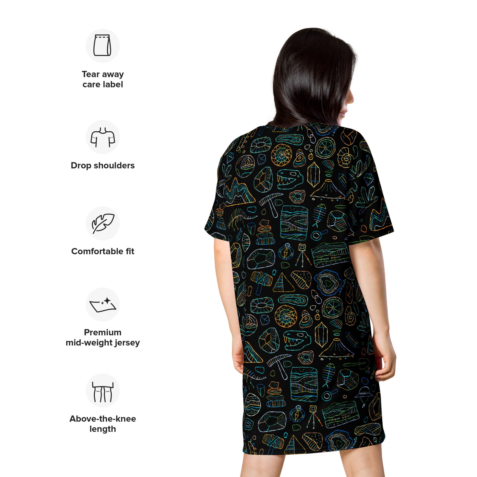 Woman in geology-themed black personalised T-shirt dress. Back side