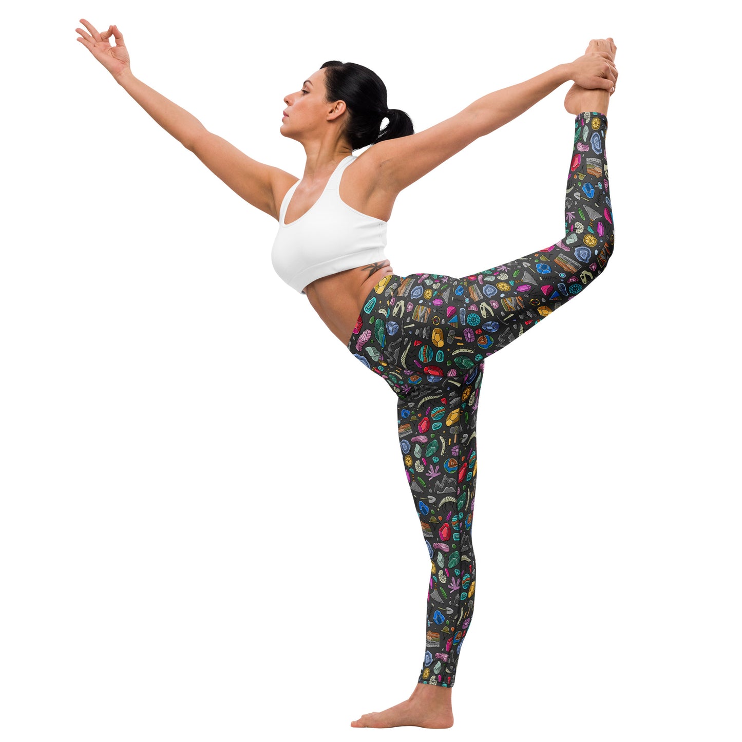 Woman doing yoga pose in KUDRY crystal and mineral leggings