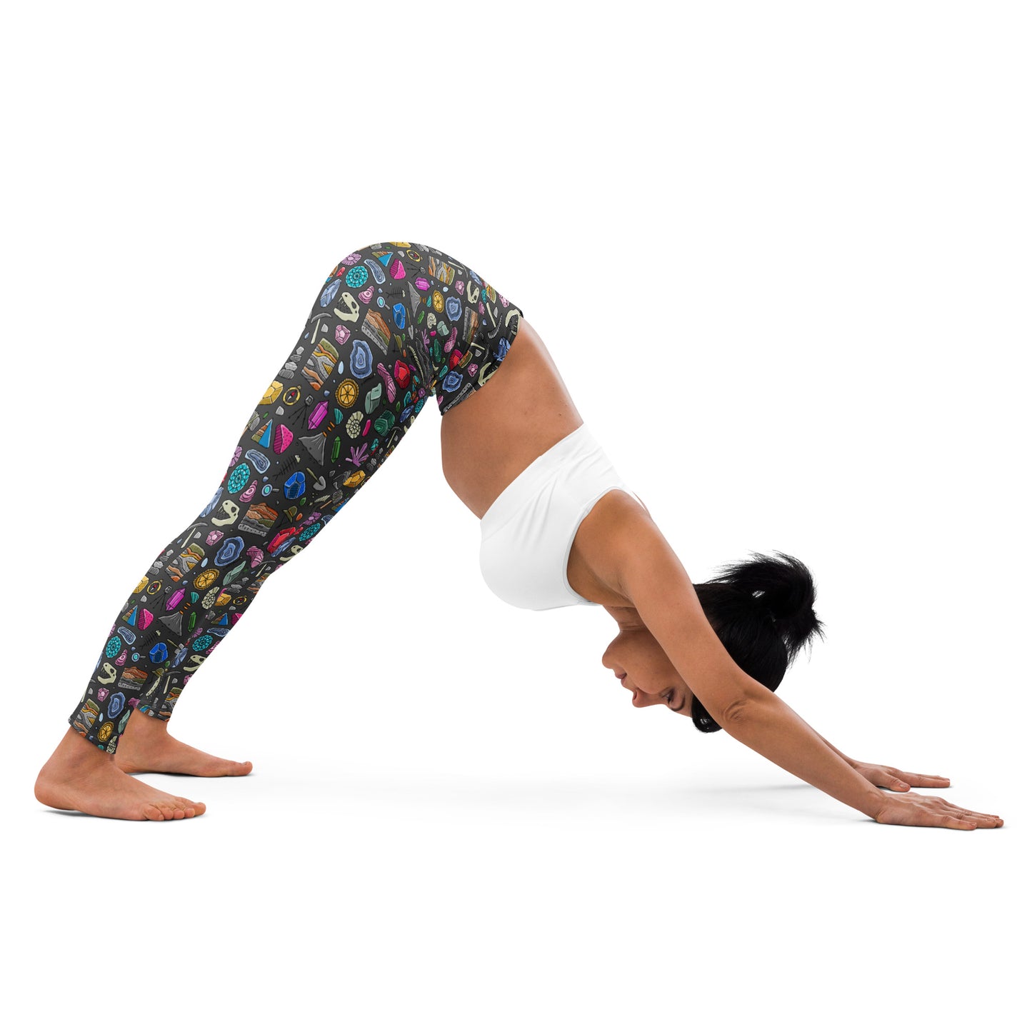 Downward dog yoga pose in KUDRY geology print leggings