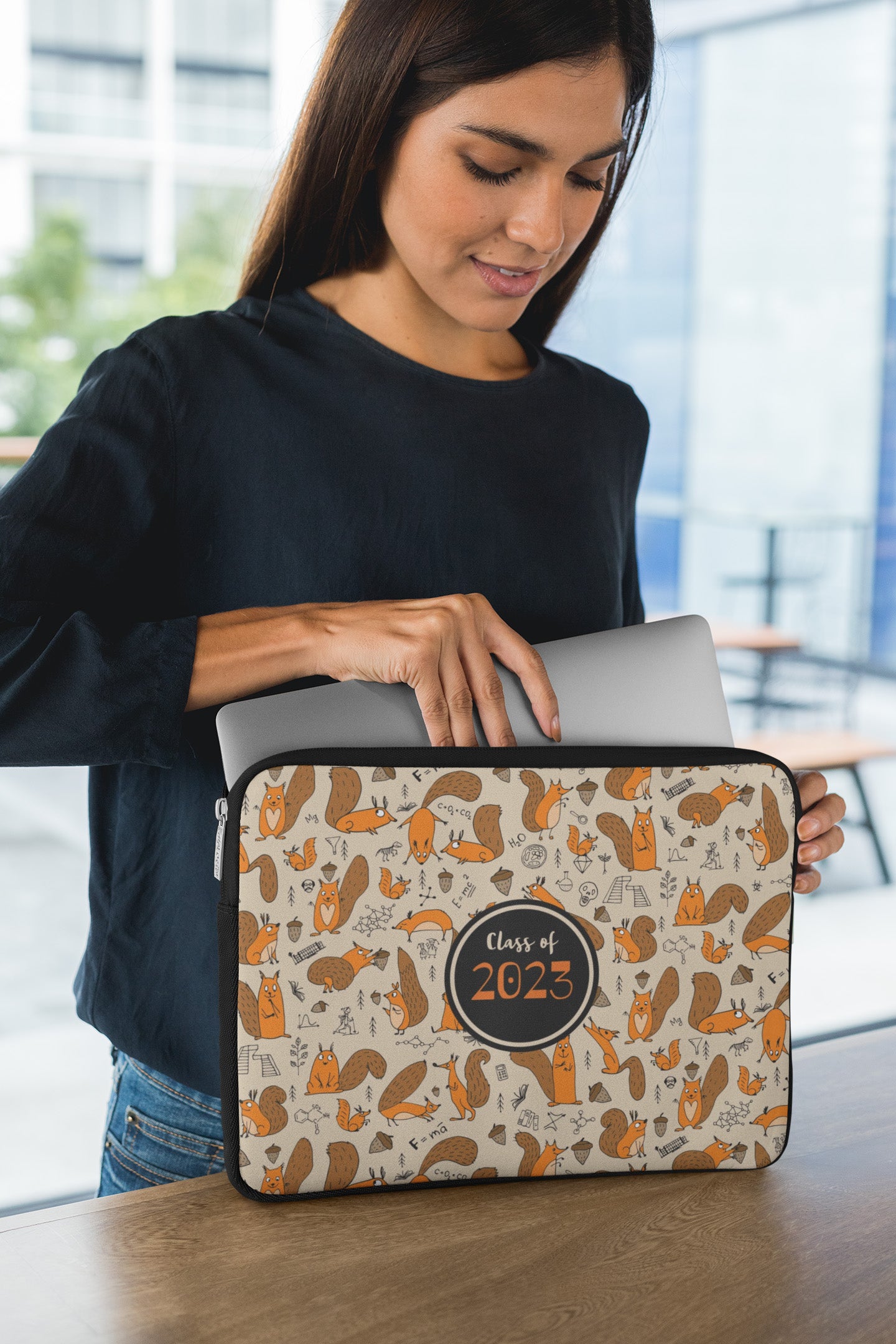 Laptop sleeve featuring young woman science squirrel