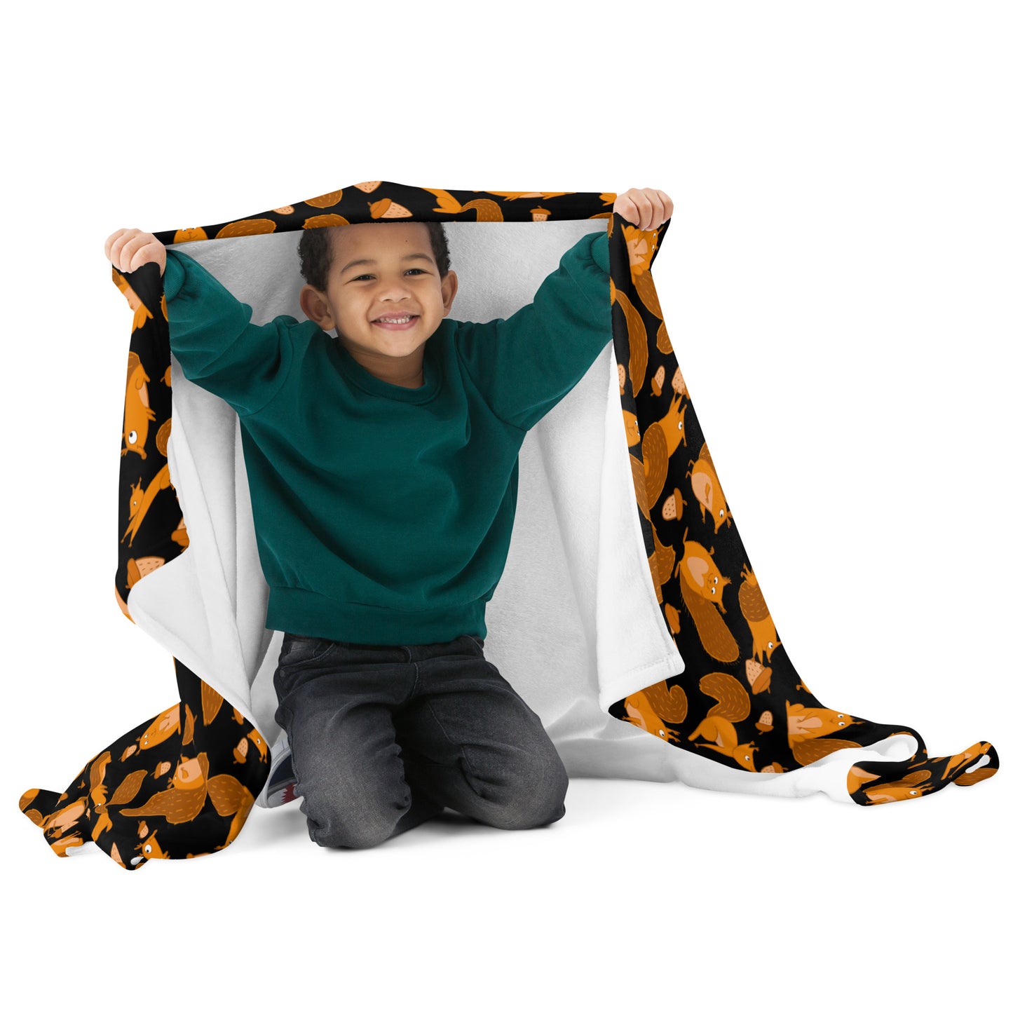 Funny little boy with Throw blanket black color with funny orange squirrels and nuts
