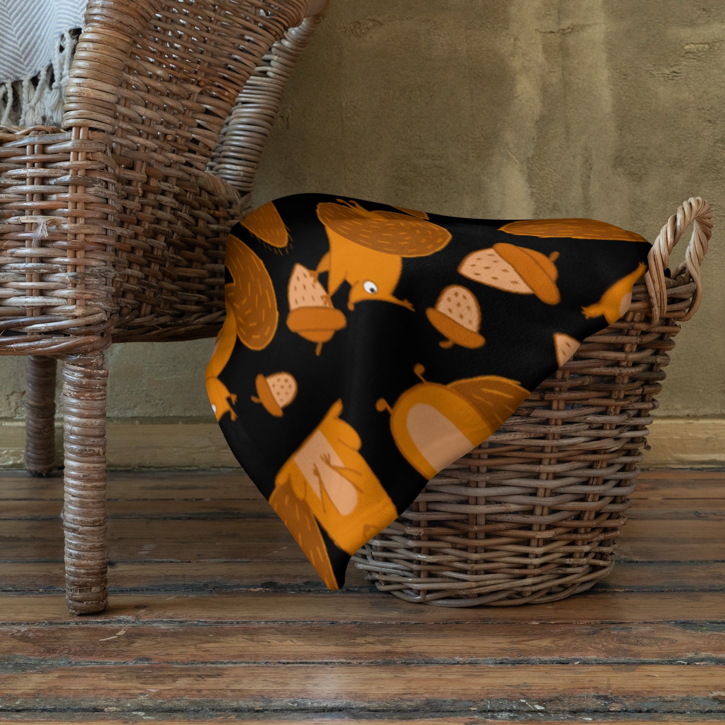 Throw blanket black color with funny orange squirrels and nuts in basket